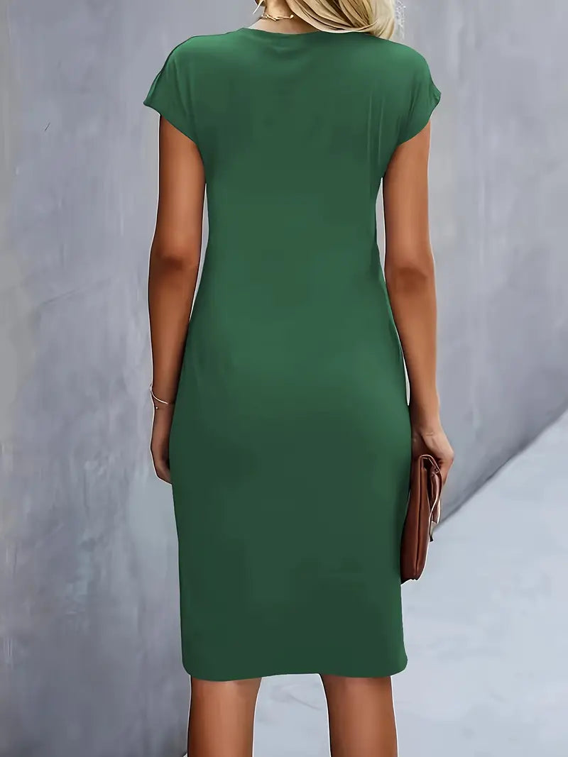 Stylish spring/summer women's dress, elegant knee-length sheath with a ruched waist detail.