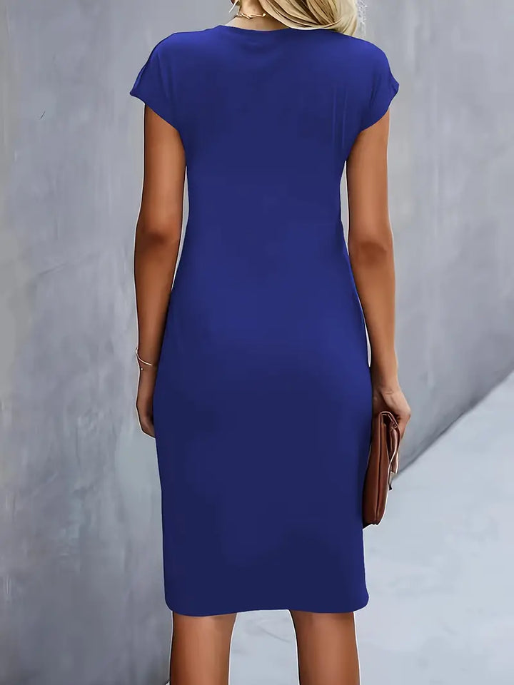 Versatile women's knee-length sheath dress with an elegant ruched waist, perfect for parties.
