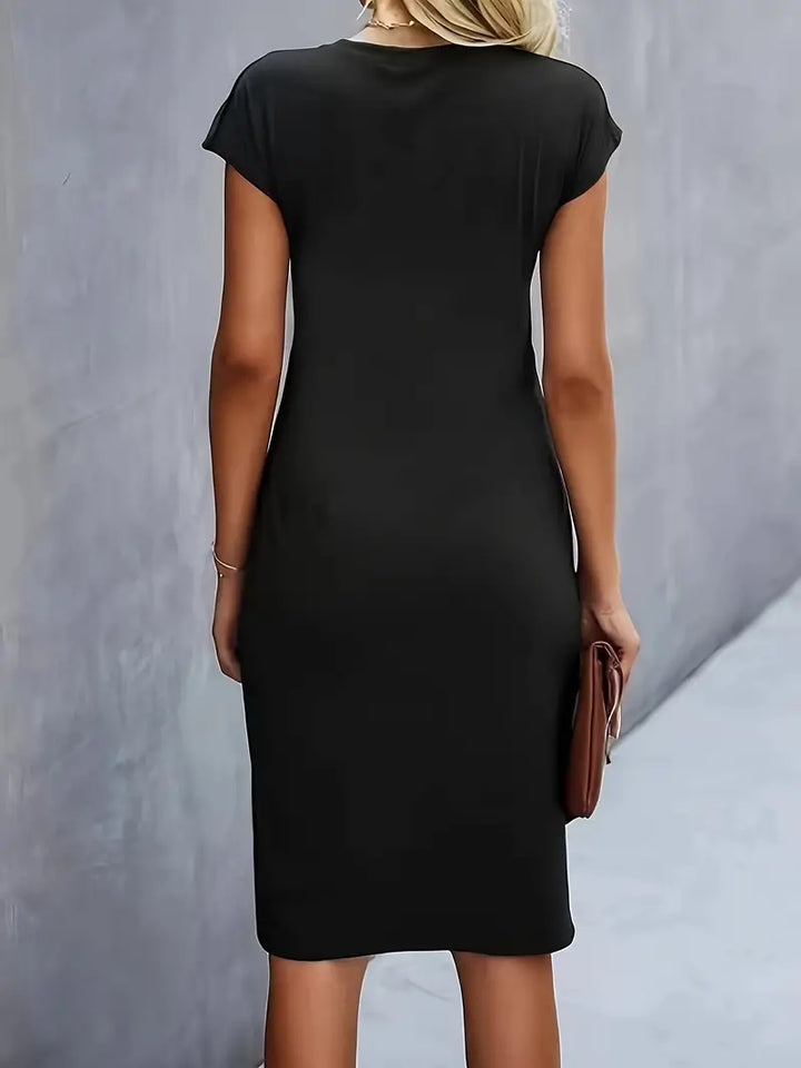 Women's versatile knee-length dress; elegant sheath style with flattering ruched detailing for parties.