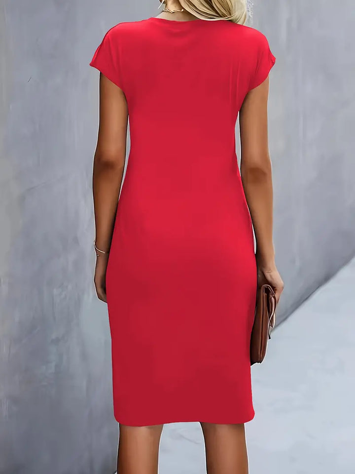 Stylish women's summer/spring sheath dress, knee-length with an elegant ruched waist design.