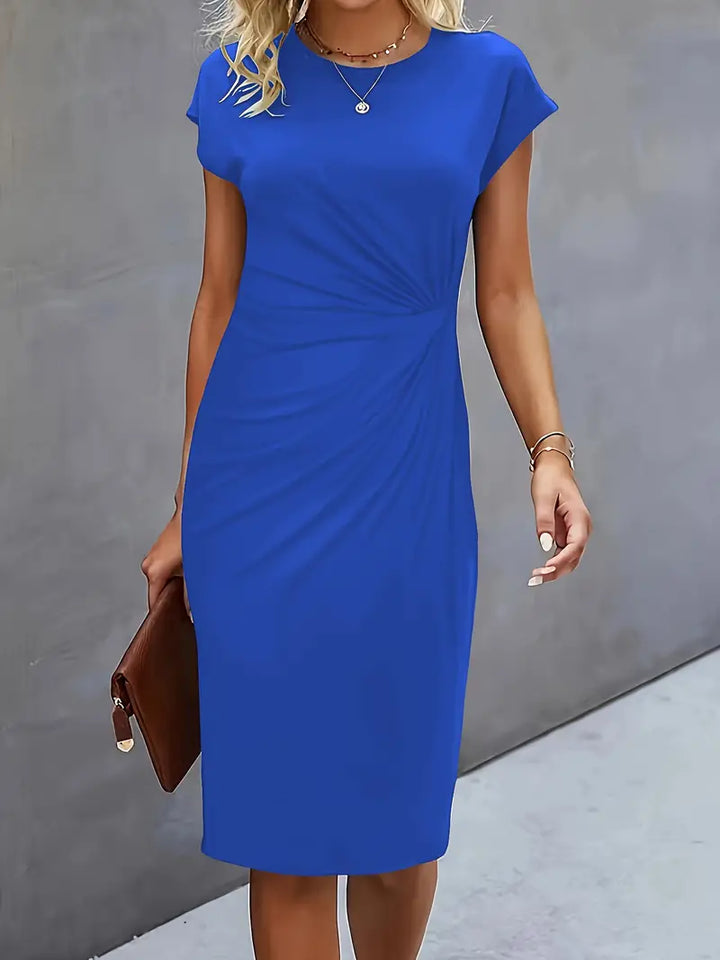 Versatile knee-length party dress, elegant women's sheath style with a chic ruched waist detail.