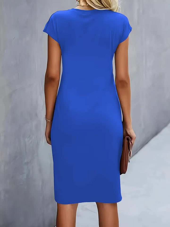 Formal women's cocktail dress, knee-length sheath with an elegant ruched waist, perfect for evenings.