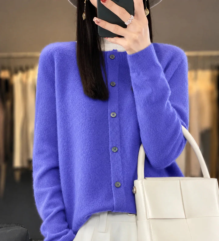 Elegant women's knit cardigan sweater with button front, long sleeves, perfect for versatile fashion and soft comfort.
