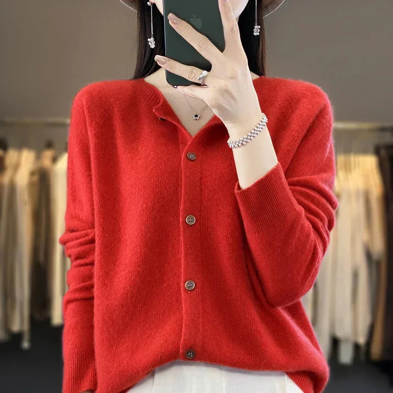 Soft knit women's cardigan sweater with elegant button front & long sleeves, a versatile piece for comfortable layering.