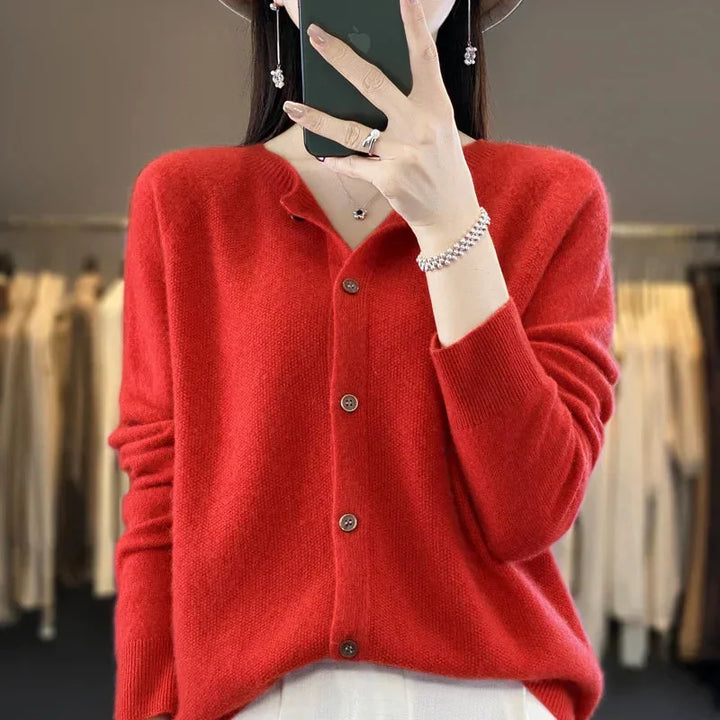 Soft knit women's cardigan sweater with elegant button front & long sleeves, a versatile piece for comfortable layering.