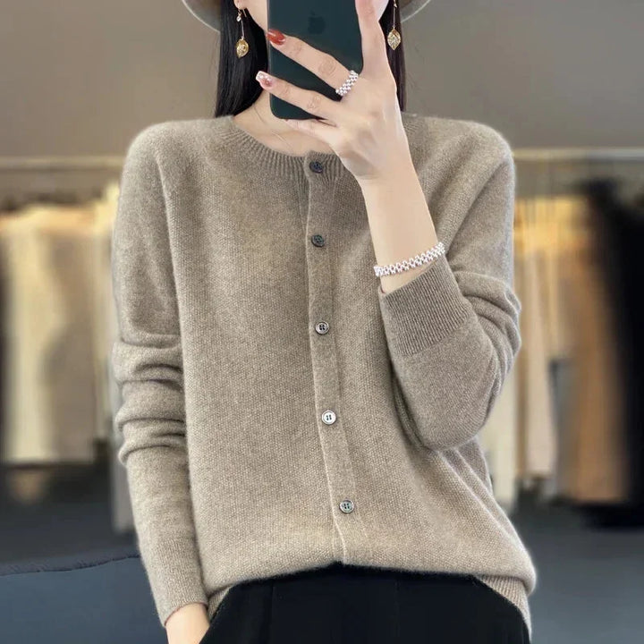 Elegant women's long sleeve knit cardigan, crew neck, button front. A versatile sweater for soft comfort & casual style.