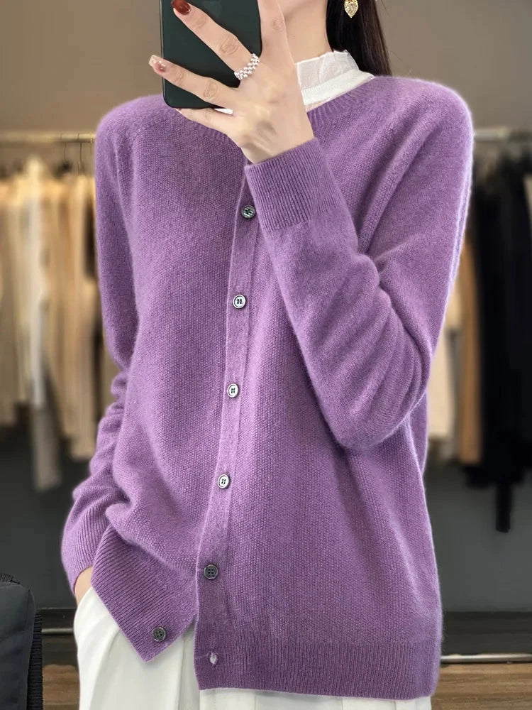Elegant women's knit cardigan top, long sleeve with button front, a versatile layering piece for sophisticated casual wear.