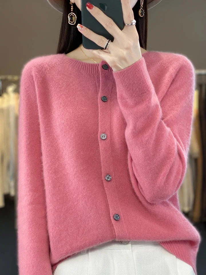 Stylish women's knit cardigan, button front & long sleeve, a versatile layering piece offering elegant soft comfort.