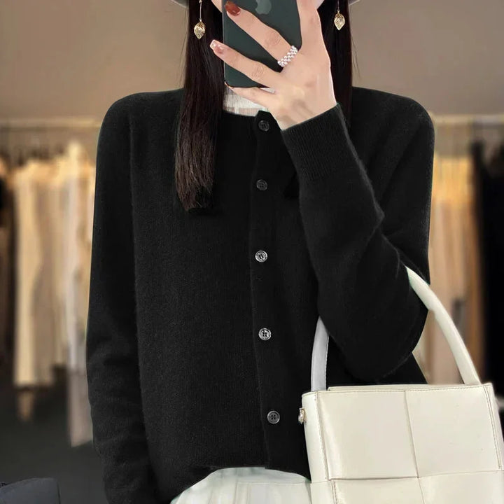 Women's button-front knit cardigan for versatile fashion. Long sleeve, elegant, and soft for comfortable casual wear.