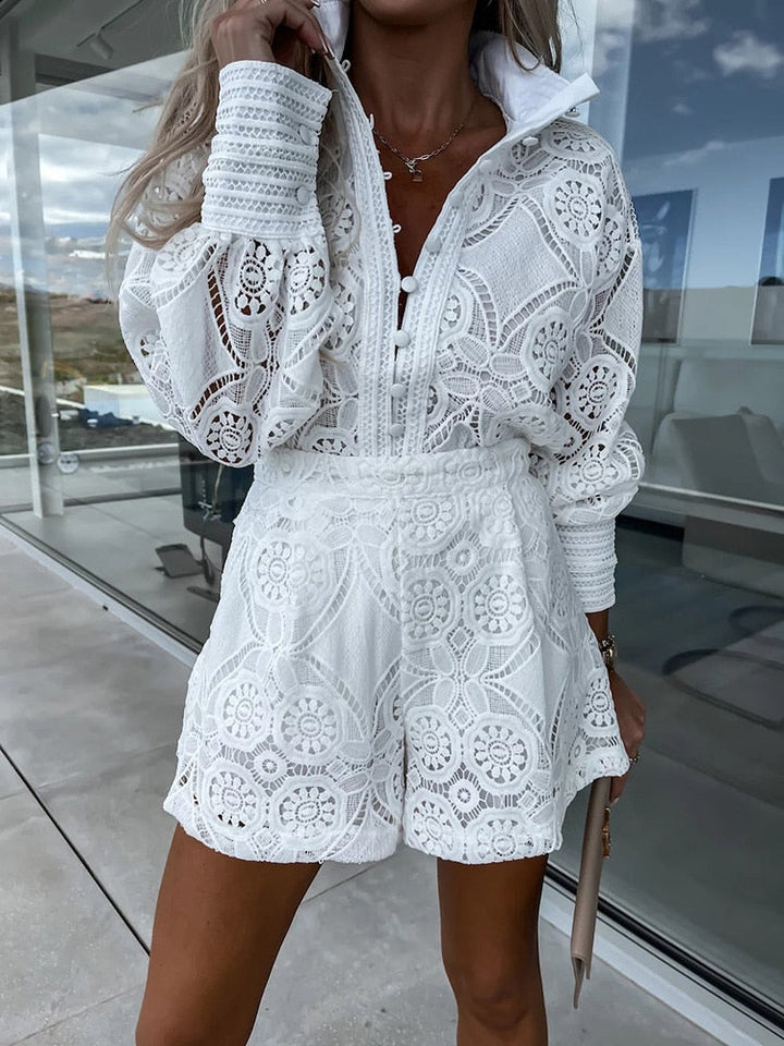 Elegant women's lace blouse and high-waist shorts set, perfect for summer.