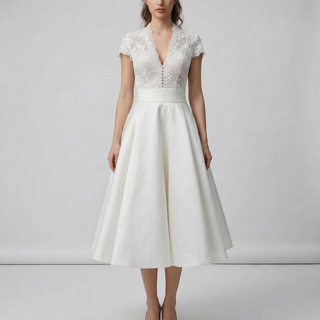 Chic A-line midi wedding dress featuring a delicate lace bodice, ideal for a special occasion.