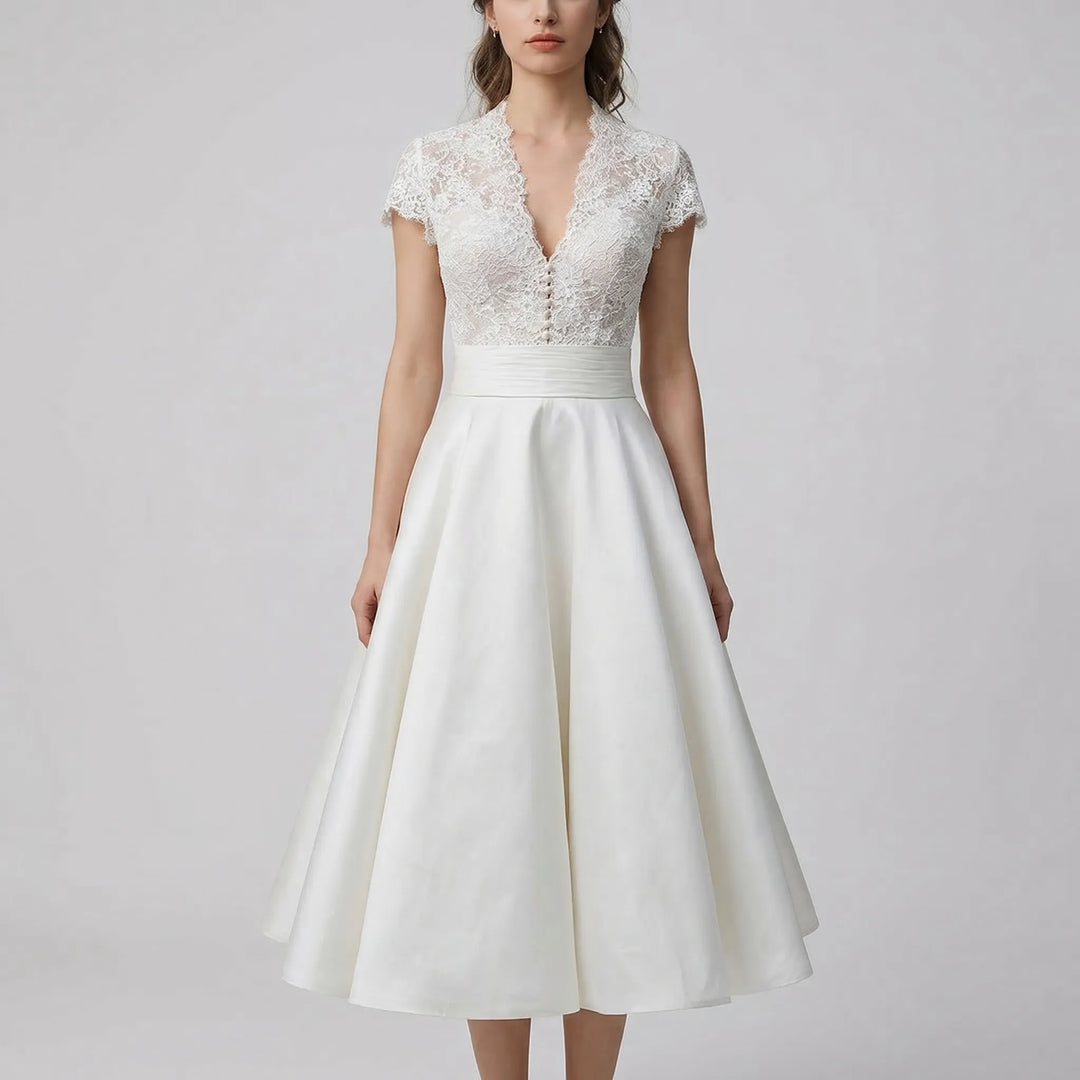 Beautiful vintage-inspired lace midi dress, a stunning choice for a garden wedding ceremony.