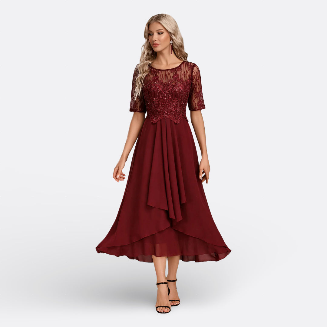 Intricate lace pattern elegant midi dress for women, ideal for formal wear and special occasions.