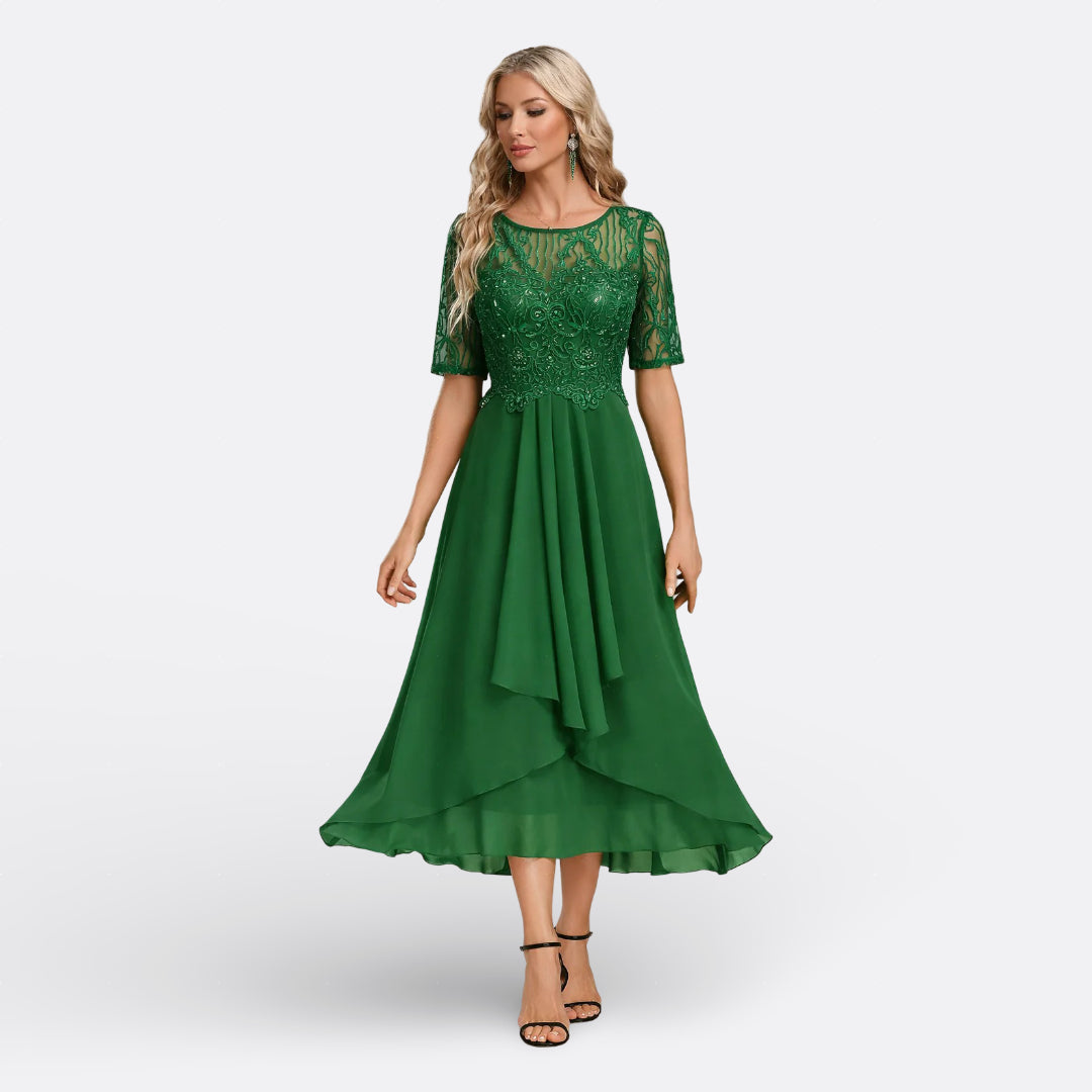 Luxurious formal lace dress for women, suitable for special occasions, featuring midi length.