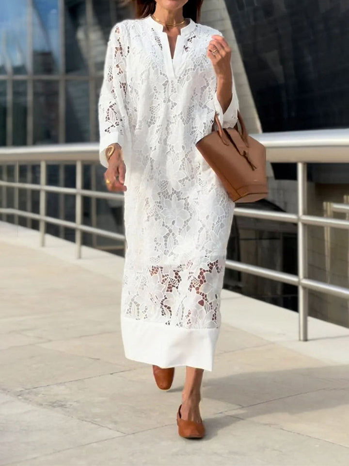 Comfortable & stylish women's floral lace midi dress, featuring a stand-up collar, suitable for elegant daytime or evening wear.