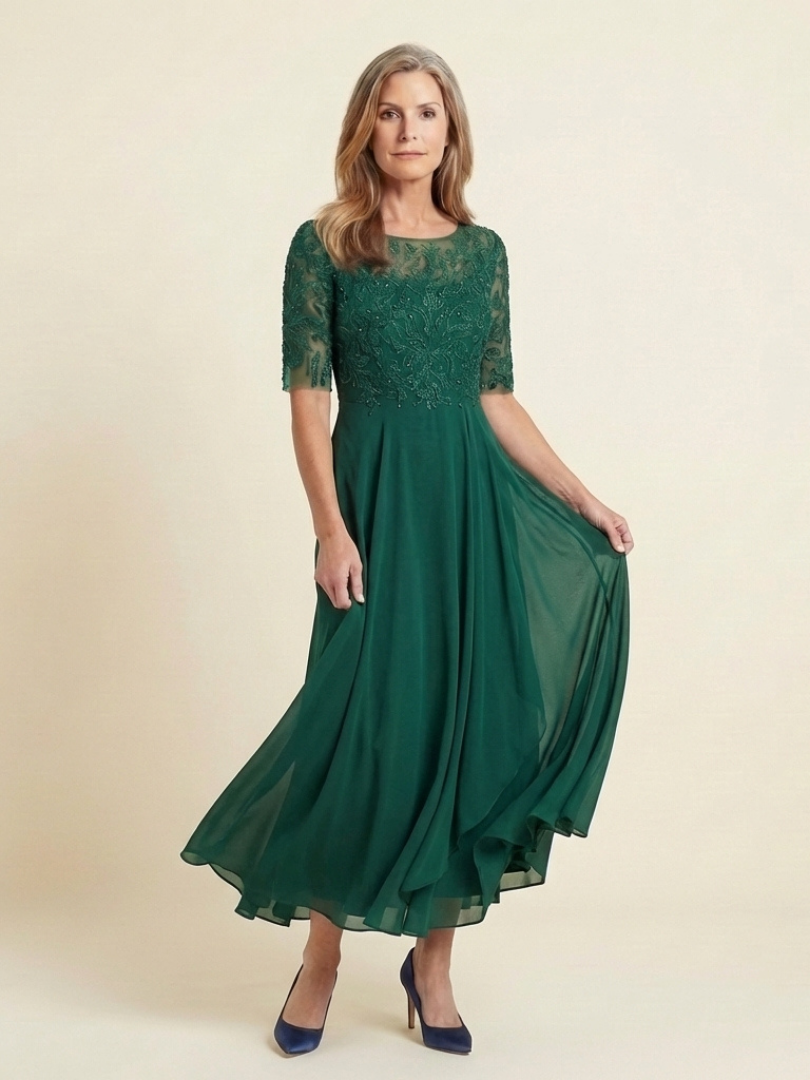Elegant women's party dress: a timeless lace midi gown with flattering three-quarter sleeves.