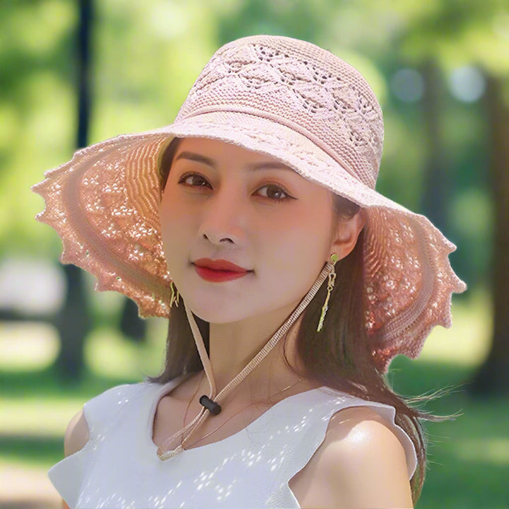 Versatile women's elegant lace sun hat. Wide brim provides UV protection for summer, beach, travel & outdoor style.