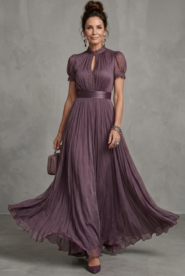 Stylish women's party dress: a pleated maxi gown with elegant lace trim, puff sleeves, & A-line silhouette.