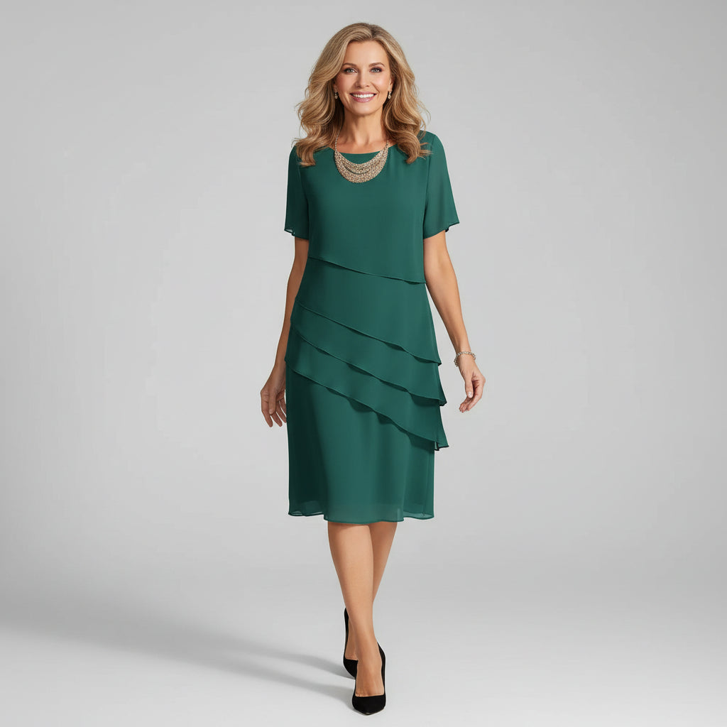 Women's celebration dress: sophisticated layered chiffon midi style.