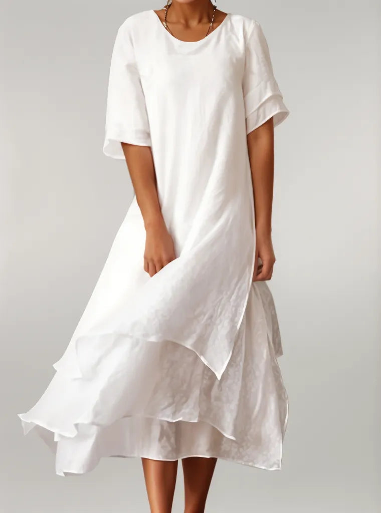Beautiful women's layered midi dress with an elegant silhouette, suitable for parties & versatile fashion.