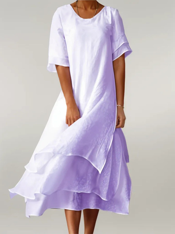 Comfortable & chic women's layered midi dress. An elegant, versatile piece for any season or event.