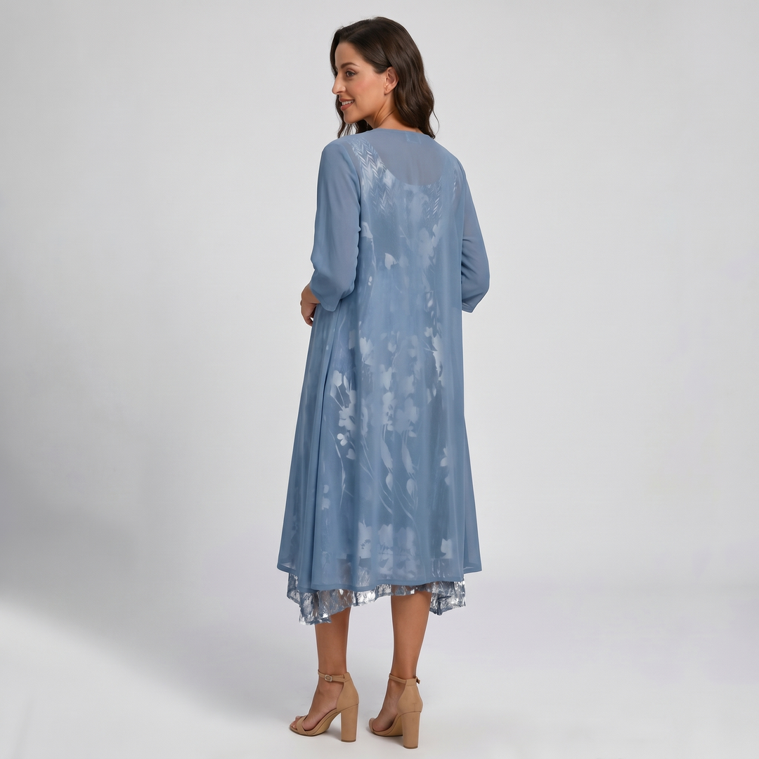 Full length view of a women's elegant layered open front midi dress. Flowing fabric & chic.