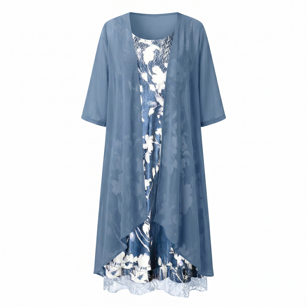 Back view of a women's elegant layered midi dress, flowy. Great for spring & summer fashion.