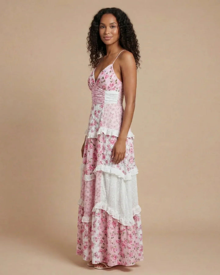 Flowing pink layered ruffle maxi dress for women, featuring a chic open back design. Ideal for elegant occasion wear.