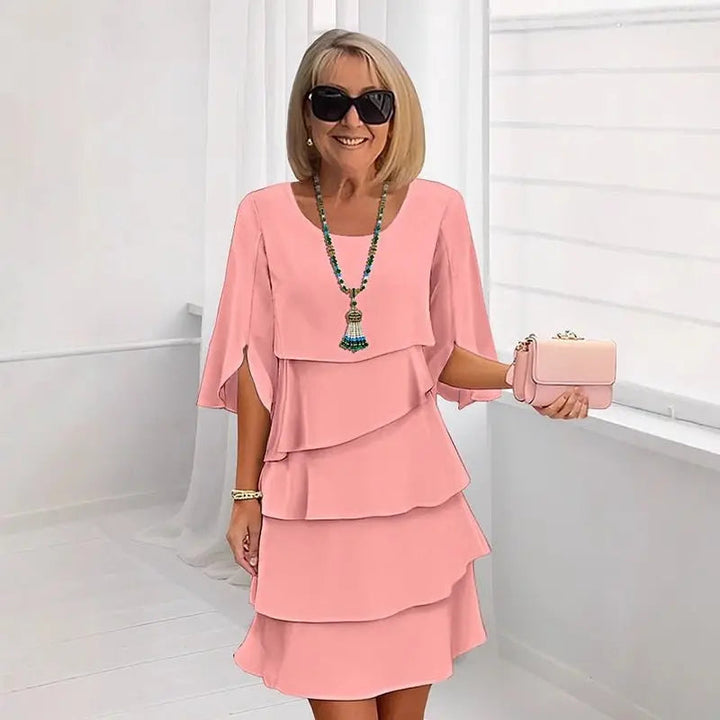 Beautiful women's layered ruffle dress with three-quarter sleeves, an elegant and versatile midi style.