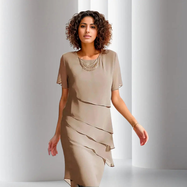 Sophisticated women's layered tiered midi evening dress with short sleeves, offering elegant style.