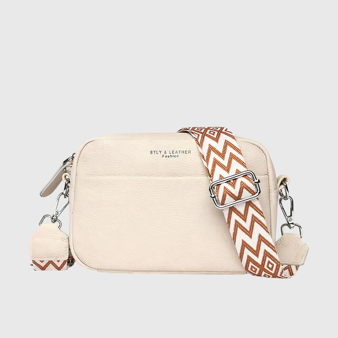 Versatile women's leather crossbody shoulder bag for daily essential fashion & elegance.