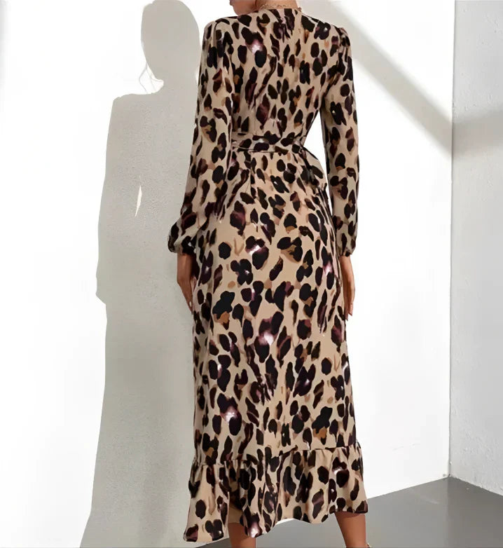 Women's stylish long sleeve midi dress. V-neck, A-line silhouette with a trendy leopard animal print pattern.