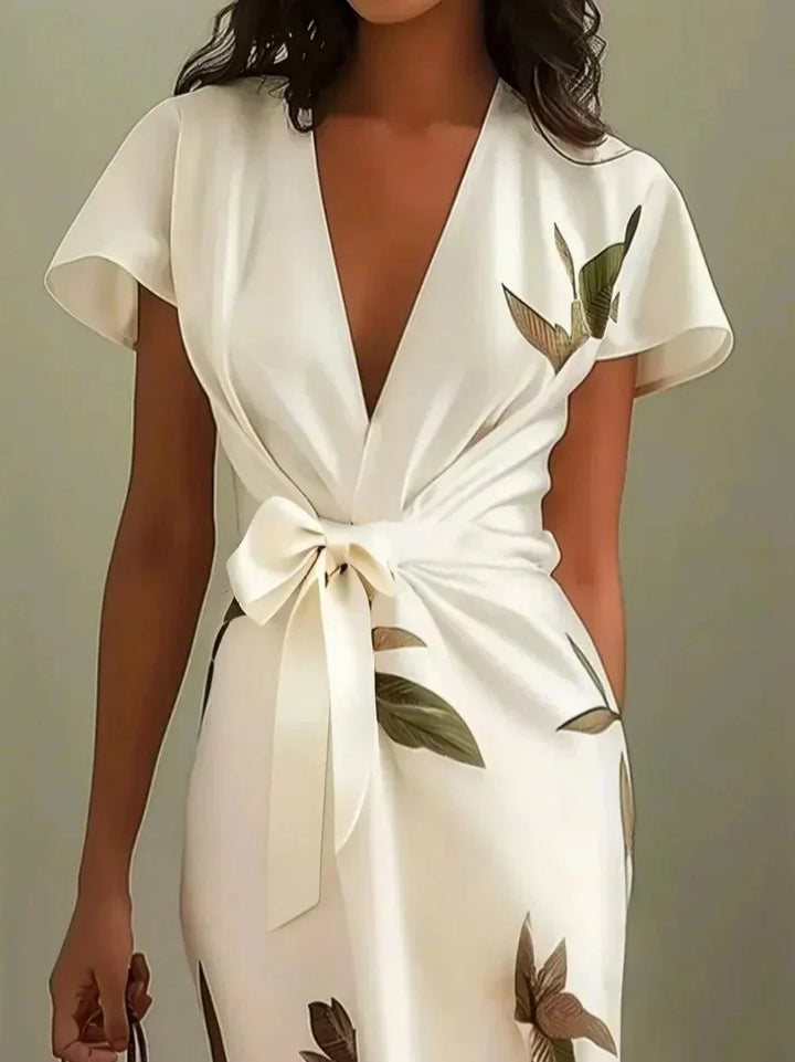 Comfortable women's elegant wrap midi dress, a stylish summer essential for daytime and evening elegance.