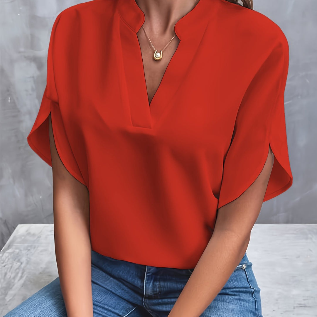 Close-up of the fabric detail on a women's elegant lightweight blouse.