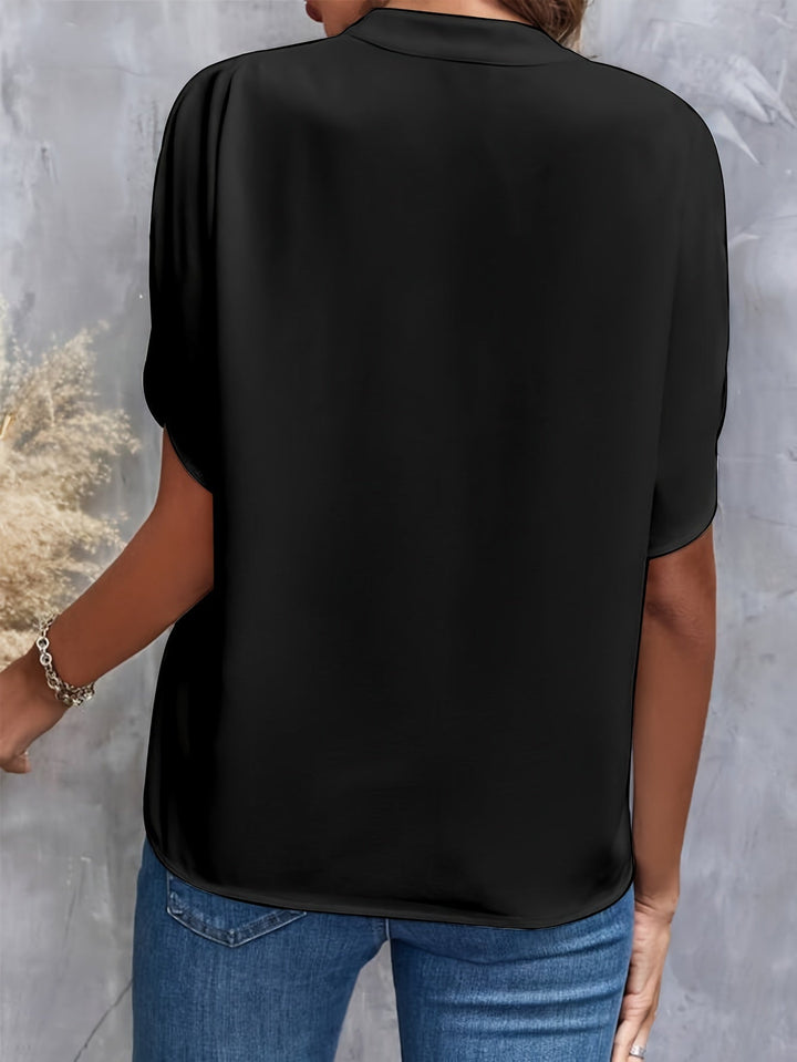 Chic women's fashion top, an elegant and breathable blouse for any season.