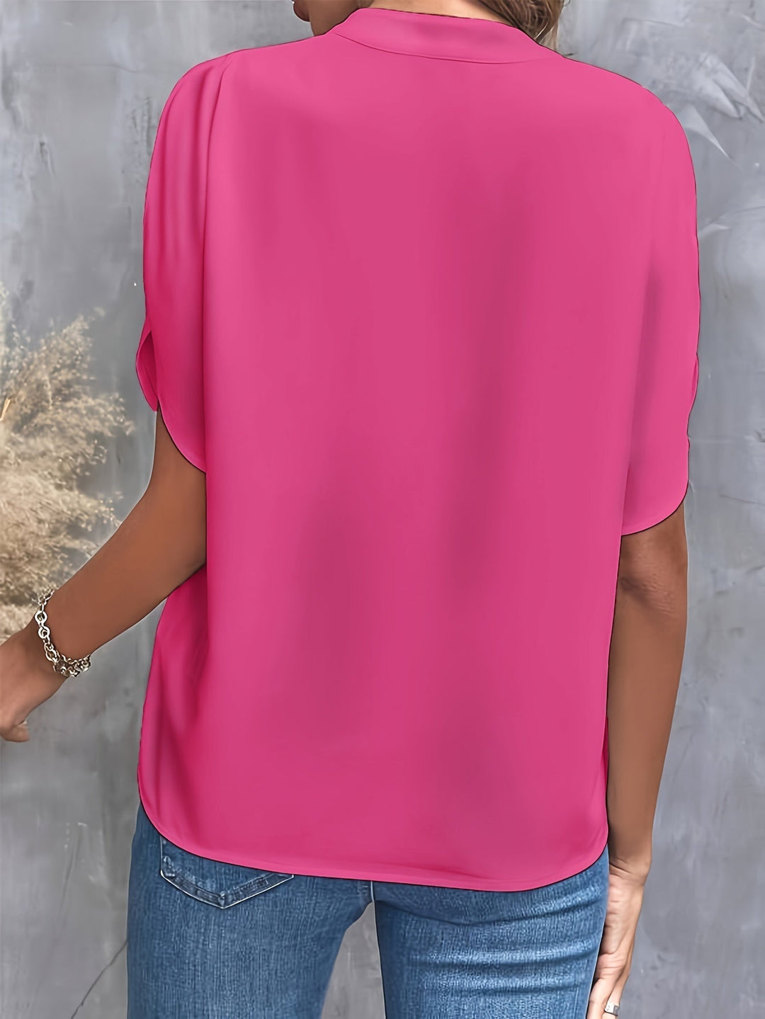 Casual yet elegant women's blouse, designed for comfortable all-season wear.