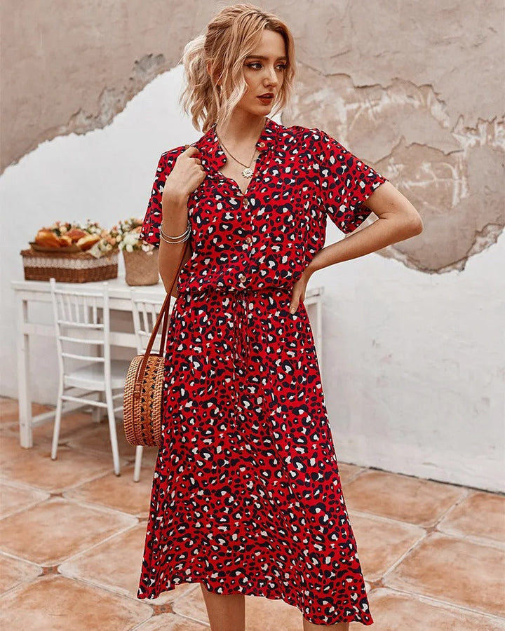 Elegant women's lightweight spring midi dress, flattering and flowy, ideal for summer gatherings or daywear.