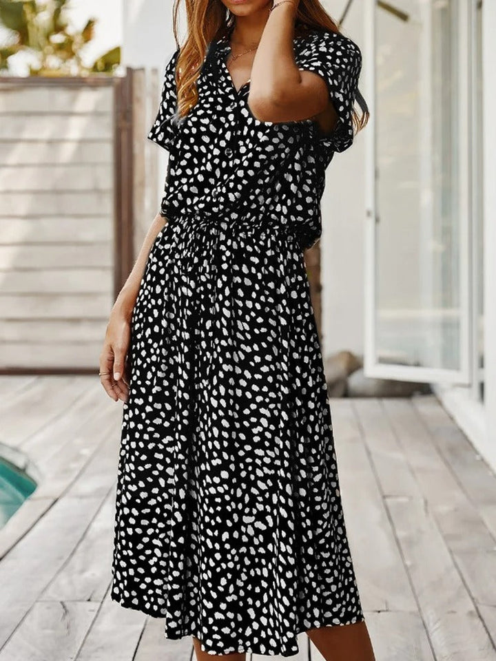 Sophisticated women's summer midi dress, lightweight, flowy, and comfortable for any elegant casual occasion.