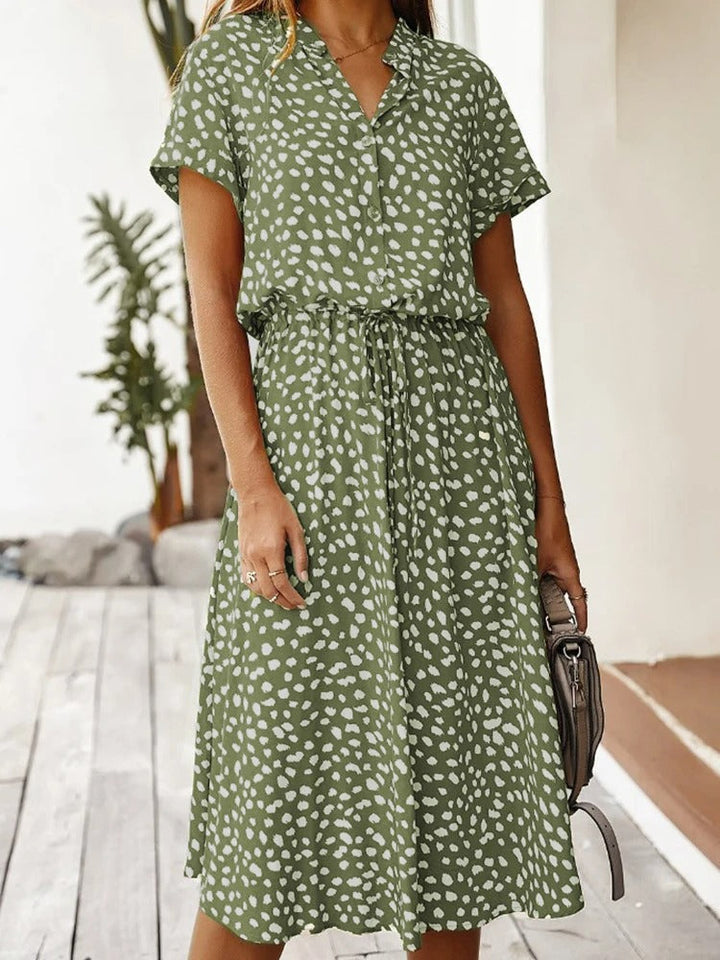 Sophisticated women's summer midi dress, flowy and lightweight, perfect for a relaxed yet elegant look.