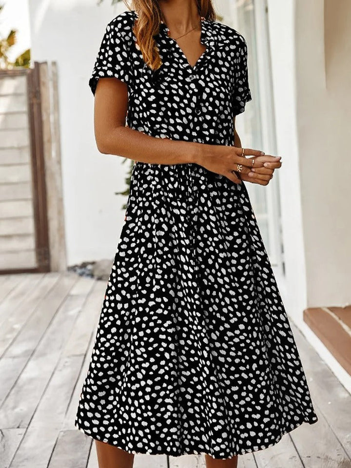 Casual yet elegant women's midi dress, lightweight for summer, flowy silhouette, perfect for any occasion.