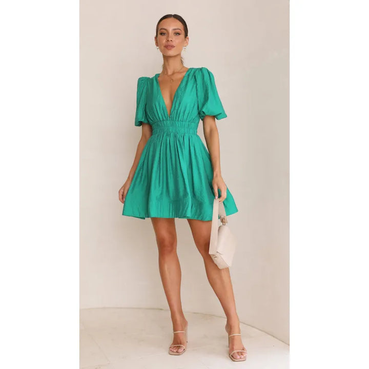 Versatile women's elegant mini dress. Lightweight summer design, easily transitions from day to night wear.