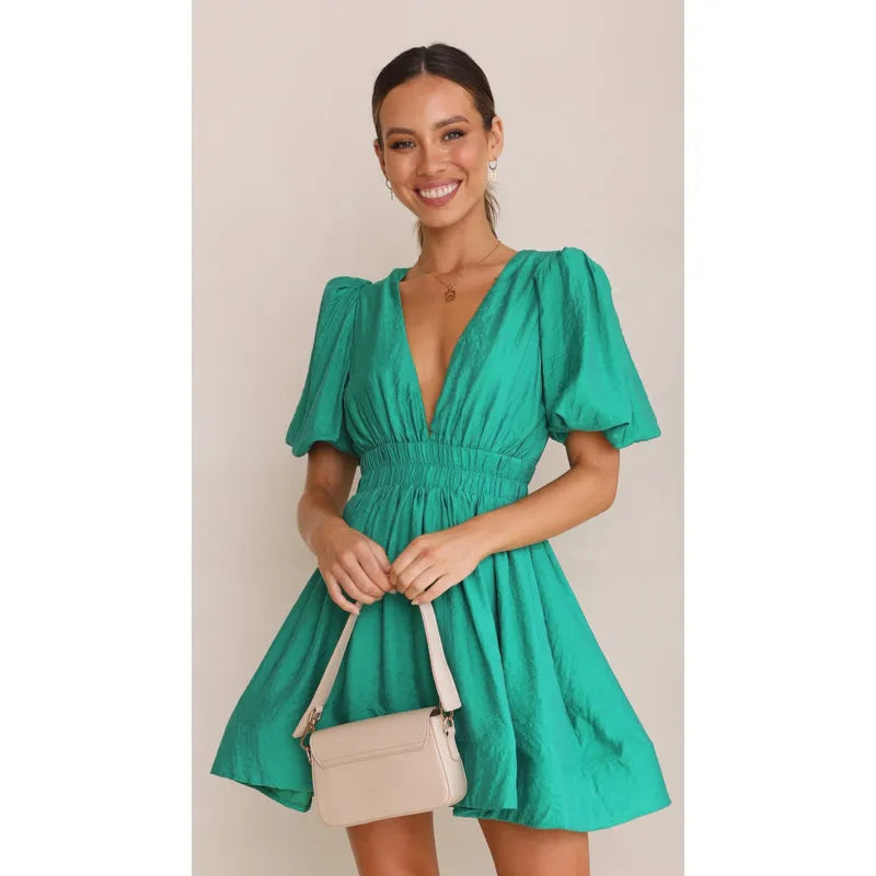 Flattering women's mini dress, lightweight for summer. Elegant yet casual, a comfortable holiday fashion choice.