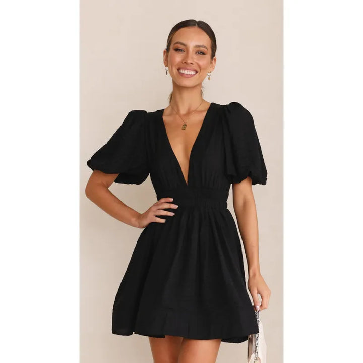 Lightweight women's summer mini dress for ultimate comfort. Elegant and casual, perfect for any warm weather occasion.