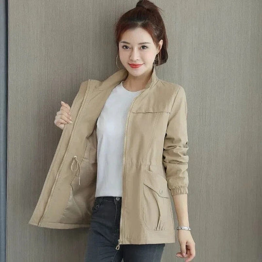 Stylish women's lightweight trench jacket. Waterproof rain coat for elegant spring & fall fashion. Weather resistant.