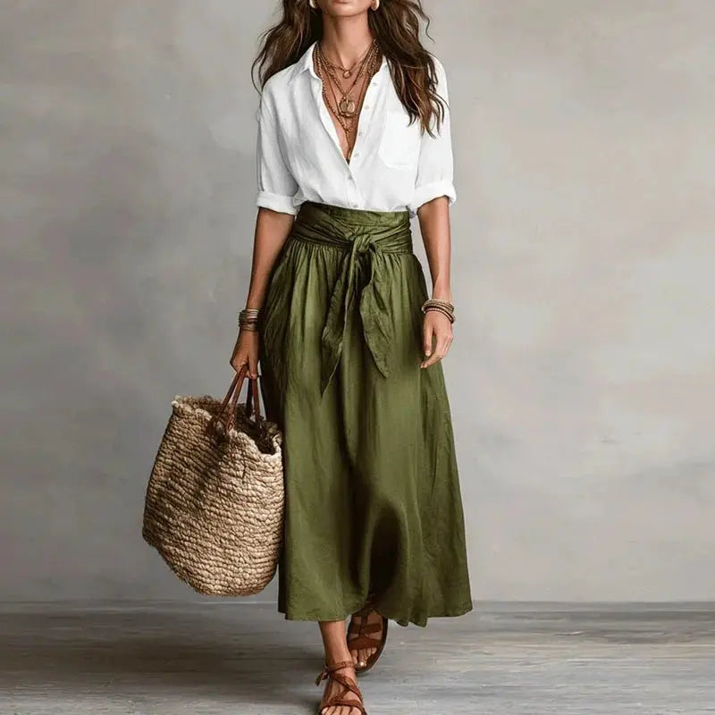Versatile women's linen co-ord with tie-waist midi skirt & elegant button-down shirt. Summer fashion.