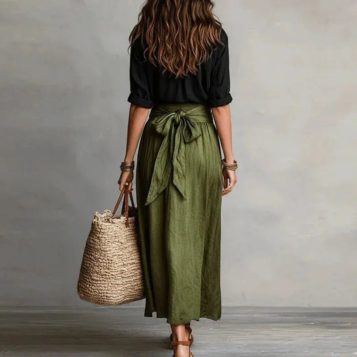 Casual chic women's linen co-ord set with a button-front top and a comfortable, elegant midi skirt.