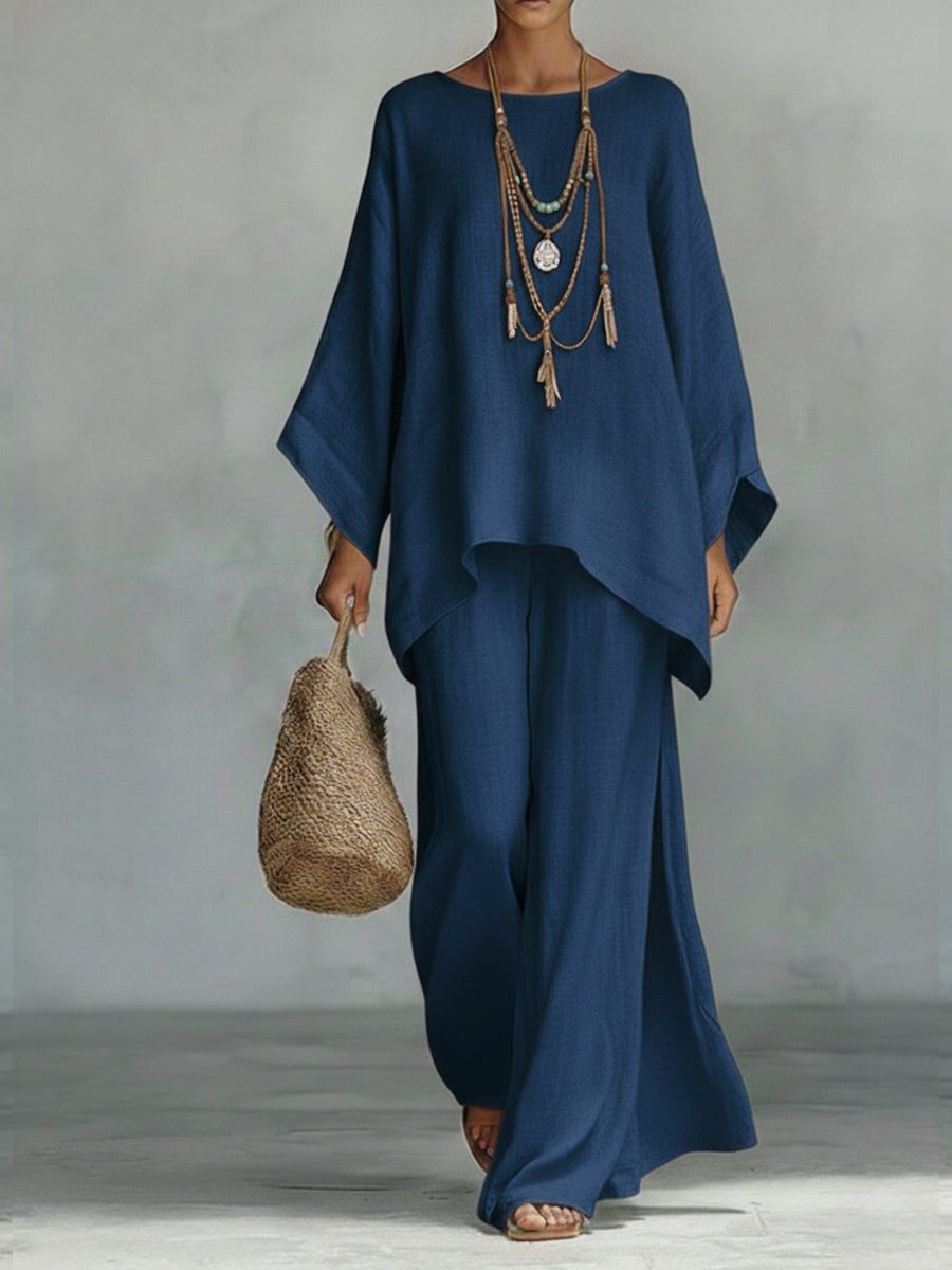Women's oversized wide sleeve linen top & matching wide leg trousers. Elegant, comfortable two-piece outfit.
