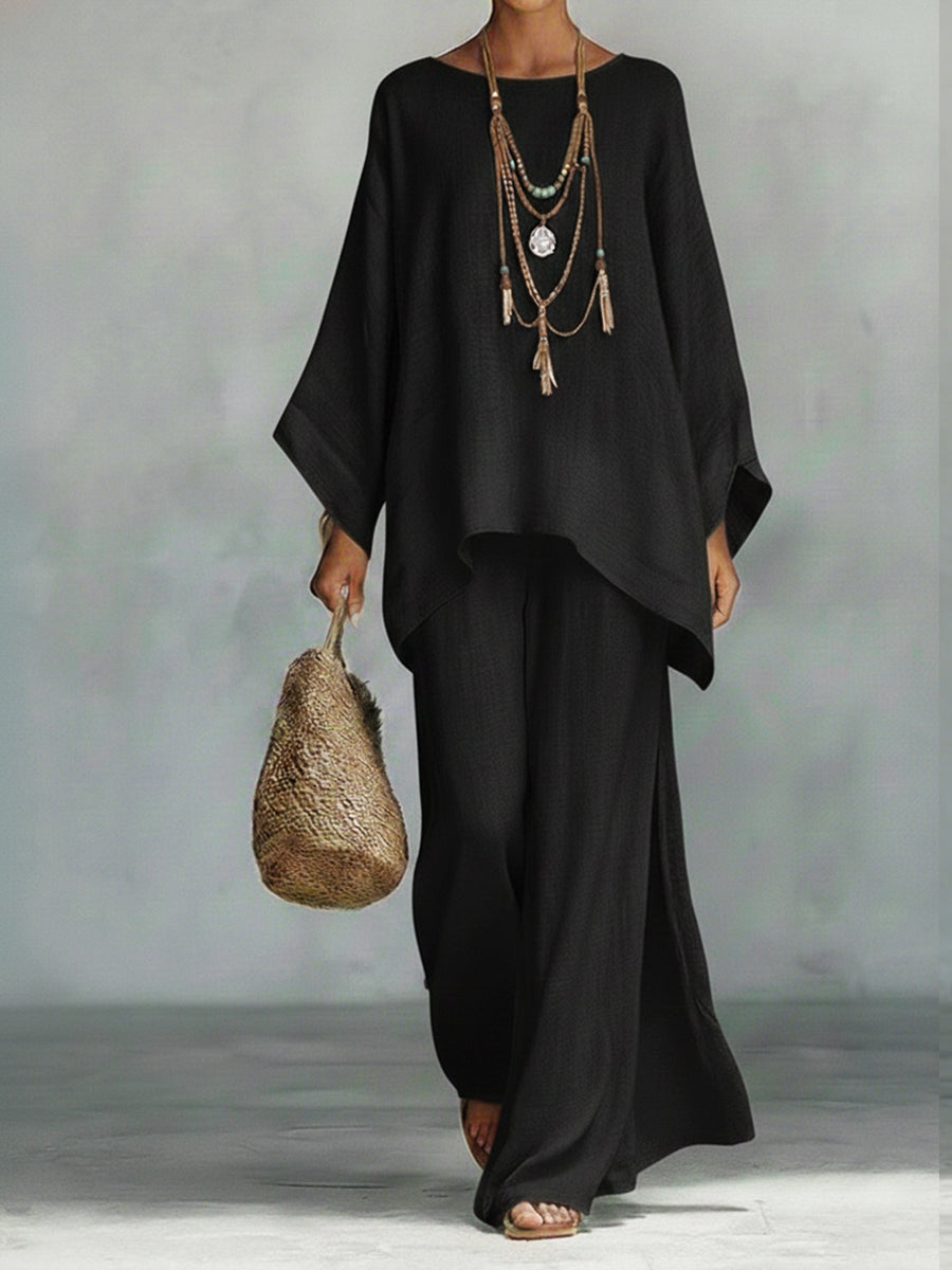 Women's elegant wide sleeve linen trouser set. A breathable, stylish two-piece for summer fashion & casual chic.