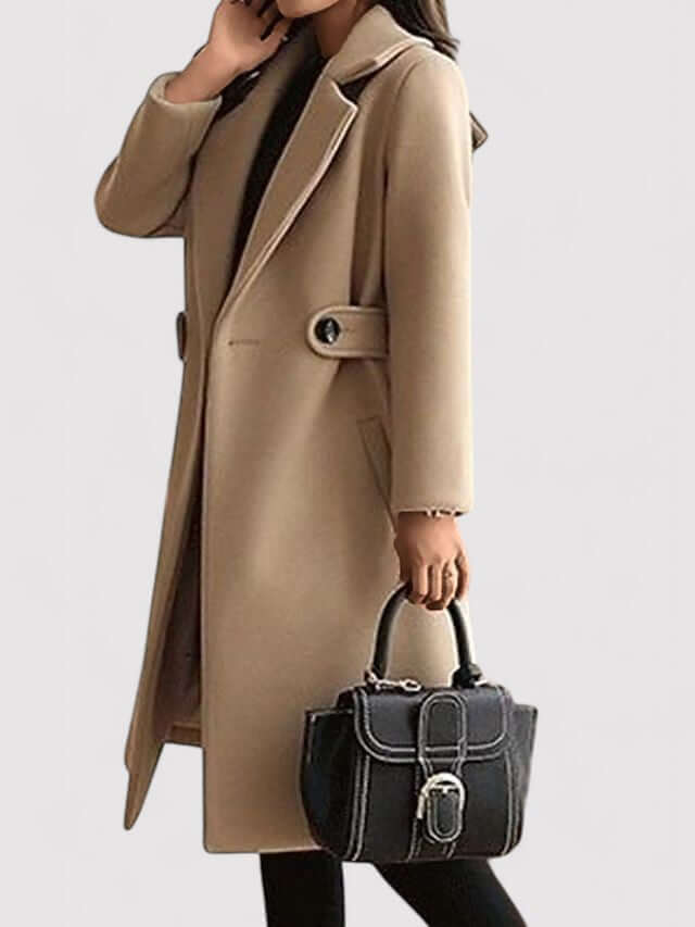 Fashionable brown women's long winter jacket with a chic belt. Perfect warm outerwear.