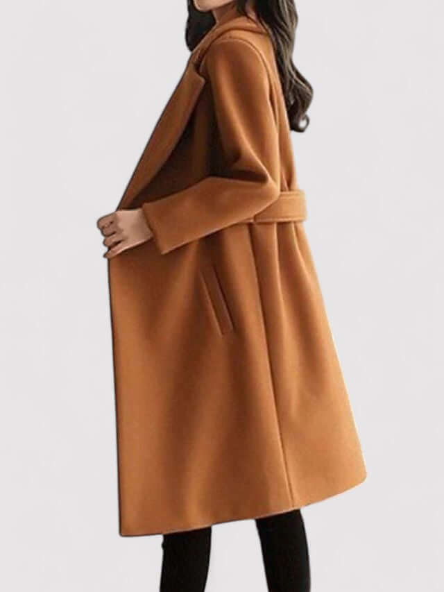 Cozy women's long belted winter coat. Warm and elegant outerwear for fall & winter fashion.